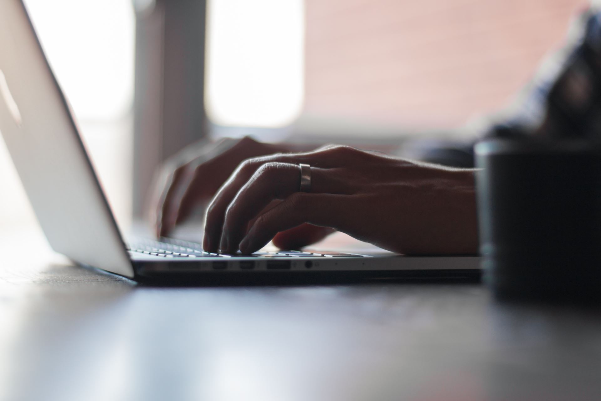 a close up of a laptop computer sitting on top of a desk